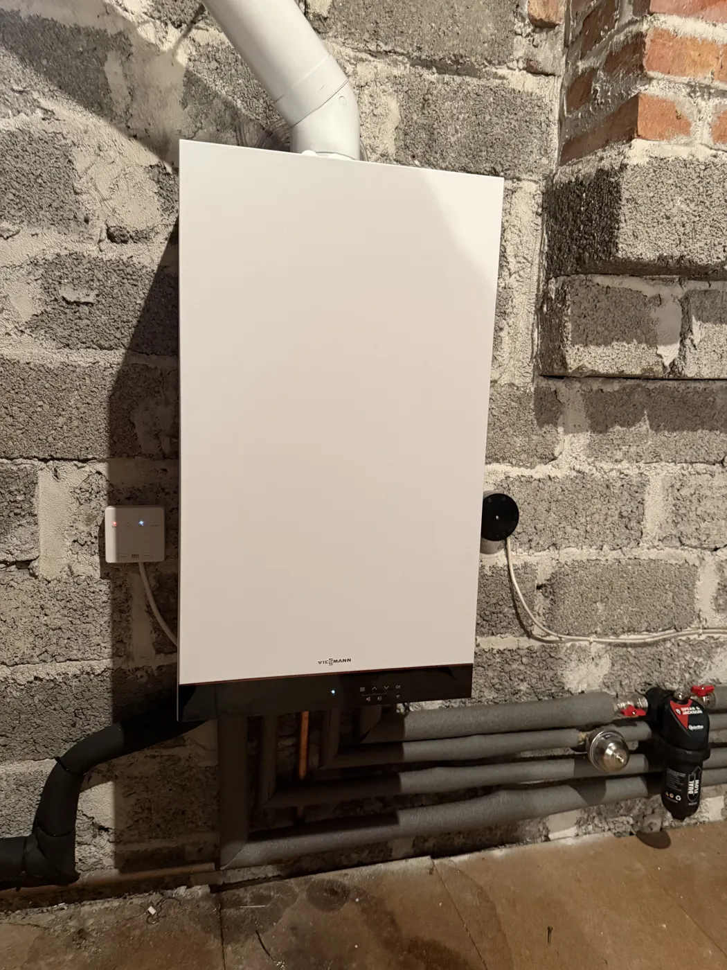Viessmann boiler installation with new flue and insulated pipework